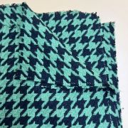 Green houndstooth bouclé fabric by the yard, textured tweed material for jackets & dresses