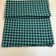 Green houndstooth bouclé fabric by the yard, textured tweed material for jackets & dresses