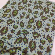 Mint green leopard print fabric, soft cotton viscose blend, lightweight, animal print sewing material